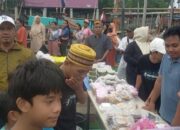 Jelang Buka Puasa Win Mas Oficial Bagikan 600 Takjil ke Warga Nelayan Muara Angke